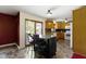 Bright kitchen features an island with seating, stainless steel appliances, and ample cabinet space at 10363 N County Road 950 E, Brownsburg, IN 46112