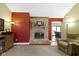 Cozy living room featuring a brick fireplace and an open layout at 10363 N County Road 950 E, Brownsburg, IN 46112