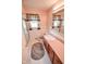 Bathroom featuring a toilet, sink, vanity, and walk in shower at 10827 Wonderland Dr, Indianapolis, IN 46239