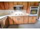 Close up of kitchen featuring modern appliances and light wood cabinets at 10827 Wonderland Dr, Indianapolis, IN 46239