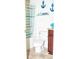 Well-decorated bathroom with a shower, nautical-themed decor, and a clean, functional design at 10835 Spirit Dr, Ingalls, IN 46048