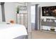 A bedroom showcasing a four poster bed, dresser, television and carpeted floors at 10835 Spirit Dr, Ingalls, IN 46048
