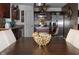 Eat-in kitchen featuring a wooden dining table, stainless steel appliances, and stylish decor at 10835 Spirit Dr, Ingalls, IN 46048