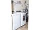 A laundry room featuring a washer, dryer and wire shelving for laundry supplies at 10835 Spirit Dr, Ingalls, IN 46048