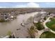 Beautiful aerial view of waterfront properties along the lake and lush green lawns at 11319 Shoreview Ln, Indianapolis, IN 46236