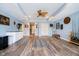 This basement is spacious and features hardwood floors, ample storage, and a ceiling fan at 11319 Shoreview Ln, Indianapolis, IN 46236