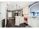Spacious kitchen with custom cabinetry, granite countertops, and stainless steel appliances at 11319 Shoreview Ln, Indianapolis, IN 46236