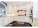 Bright kitchen featuring custom cabinetry, granite countertops, and stainless steel appliances at 11319 Shoreview Ln, Indianapolis, IN 46236