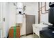 Functional utility room with a sink, central vacuum, and updated plumbing at 11319 Shoreview Ln, Indianapolis, IN 46236