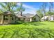 Spacious backyard featuring a gazebo, lush lawn, and patio area perfect for outdoor relaxation at 11471 Clarkston Rd, Zionsville, IN 46077