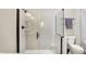 Bathroom showing a modern glass shower with white tile and a toilet at 11471 Clarkston Rd, Zionsville, IN 46077