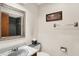 Half bathroom showing a sink and toilet at 11471 Clarkston Rd, Zionsville, IN 46077