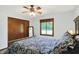 Bedroom with a window, a closet and a bed at 11471 Clarkston Rd, Zionsville, IN 46077