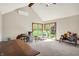 Bright bonus room with vaulted ceilings, a ceiling fan, sliding glass doors and natural light at 11471 Clarkston Rd, Zionsville, IN 46077