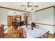 Charming dining room with hardwood floors and an archway view into the kitchen at 11471 Clarkston Rd, Zionsville, IN 46077