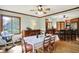 Dining room and kitchen offer natural light and hardwood floors for Gathering gatherings at 11471 Clarkston Rd, Zionsville, IN 46077