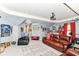 Finished basement featuring ample seating, recessed lighting, and sports-themed decor at 11550 Clarkston Rd, Zionsville, IN 46077
