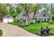 Well-maintained gray house with an attached garage, mature landscaping, and inviting curb appeal at 11550 Clarkston Rd, Zionsville, IN 46077