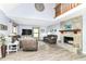 Spacious living room with vaulted ceiling, stone fireplace, and comfortable seating at 11550 Clarkston Rd, Zionsville, IN 46077