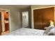This comfortable bedroom features an interior doorway and closet that are accessible from the main part of the room at 1202 S Ribble Ave, Muncie, IN 47302