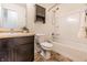 This bathroom features a vanity with wood cabinets, a toilet, and a shower-tub combo at 1221 Danielle Rd, Lebanon, IN 46052