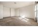 Neutral bedroom featuring carpet, natural light, and a closet at 1221 Danielle Rd, Lebanon, IN 46052