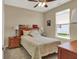 Cozy bedroom with a ceiling fan, natural light, and comfortable decor at 1401 Blackthorne N Trl, Plainfield, IN 46168