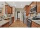 Well-equipped kitchen features stainless steel appliances and granite countertops at 1401 Blackthorne N Trl, Plainfield, IN 46168