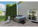 Backyard patio featuring a hot tub and lounge chair, ideal for relaxation at 1454 Woodfield Dr, Greenwood, IN 46143
