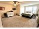 Large bedroom with carpet, ceiling fan, natural light and ample space at 1454 Woodfield Dr, Greenwood, IN 46143