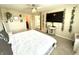 Bedroom featuring a ceiling fan, a bed with a white comforter, carpet floor, and great natural light at 1454 Woodfield Dr, Greenwood, IN 46143