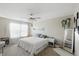 Comfortable bedroom with carpeted floors, a ceiling fan, and a comfy bed at 1454 Woodfield Dr, Greenwood, IN 46143