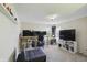 Bedroom features multiple monitors, neutral walls, and carpeted flooring at 1454 Woodfield Dr, Greenwood, IN 46143