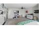 Bright bedroom features a ceiling fan, neutral walls, and plenty of space for personalization at 1454 Woodfield Dr, Greenwood, IN 46143