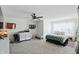 Spacious bonus room featuring carpeted floors, large windows, and a ceiling fan at 1454 Woodfield Dr, Greenwood, IN 46143