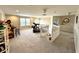 Upstairs bonus room features carpet floors, staircase, windows, and plenty of space at 1454 Woodfield Dr, Greenwood, IN 46143
