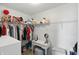 Organized walk-in closet with ample storage space, shelving, and a vanity at 1454 Woodfield Dr, Greenwood, IN 46143