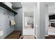 Inviting entryway features a mudroom with custom built-ins that leads into the home's interior at 1454 Woodfield Dr, Greenwood, IN 46143