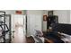 Another view of the home office with open door to the living area, plus lots of storage at 1454 Woodfield Dr, Greenwood, IN 46143
