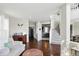 Bright living room featuring hardwood floors, open layout, and seamless transition to other living spaces at 1454 Woodfield Dr, Greenwood, IN 46143