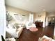 Cozy living room with plush seating, stylish decor, and ample natural light creating a warm and inviting space at 1454 Woodfield Dr, Greenwood, IN 46143