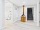 Finished basement area with a partial bathroom and access to painted stairs at 1505 E 30Th St, Anderson, IN 46016