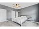Cozy bedroom with neutral colors, carpet, and ceiling fan for added comfort at 1505 Spann Ave, Indianapolis, IN 46203