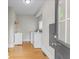 Laundry room with washer, dryer, and sink next to exterior door at 1505 Spann Ave, Indianapolis, IN 46203
