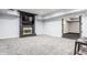 Finished basement featuring a brick fireplace, recessed lighting and neutral carpet at 1510 Continental Dr, Zionsville, IN 46077