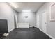 The finished basement includes a storage space with rubber flooring and storage components at 1510 Continental Dr, Zionsville, IN 46077