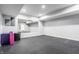 Spacious basement area, perfect for a home gym or recreation space, with mirrors for a full view at 1510 Continental Dr, Zionsville, IN 46077