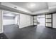 Finished basement with rubber flooring and open layout to other basement rooms at 1510 Continental Dr, Zionsville, IN 46077