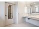 Bright bathroom features a modern mirror, sink, and countertop at 1510 Continental Dr, Zionsville, IN 46077