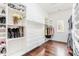 Spacious walk-in closet with custom shelving, drawers, and ample hanging space, perfect for organization at 1510 Continental Dr, Zionsville, IN 46077